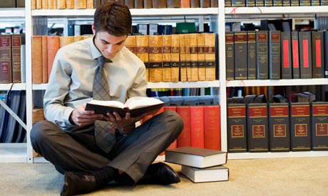 Law student consults books